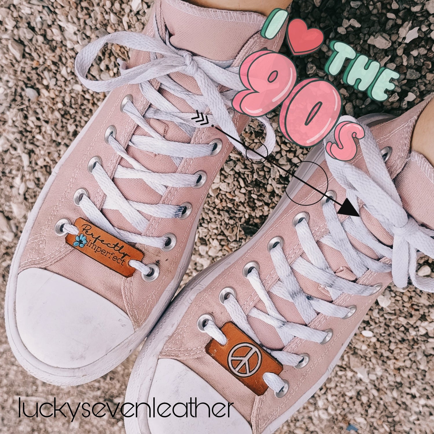 woman wearing pink sneakers, decorated with handmade leather shoelace tags