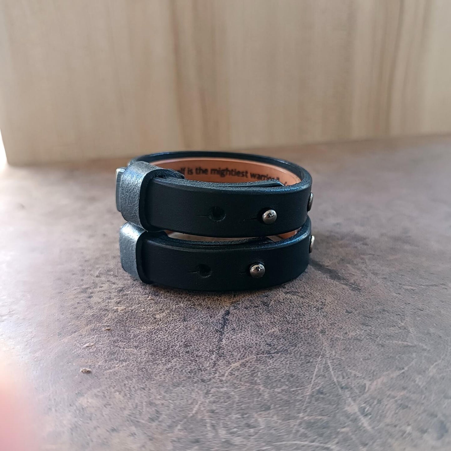 Backside of the Black Vachetta Leather Bracelets with custom engraved hidden messages