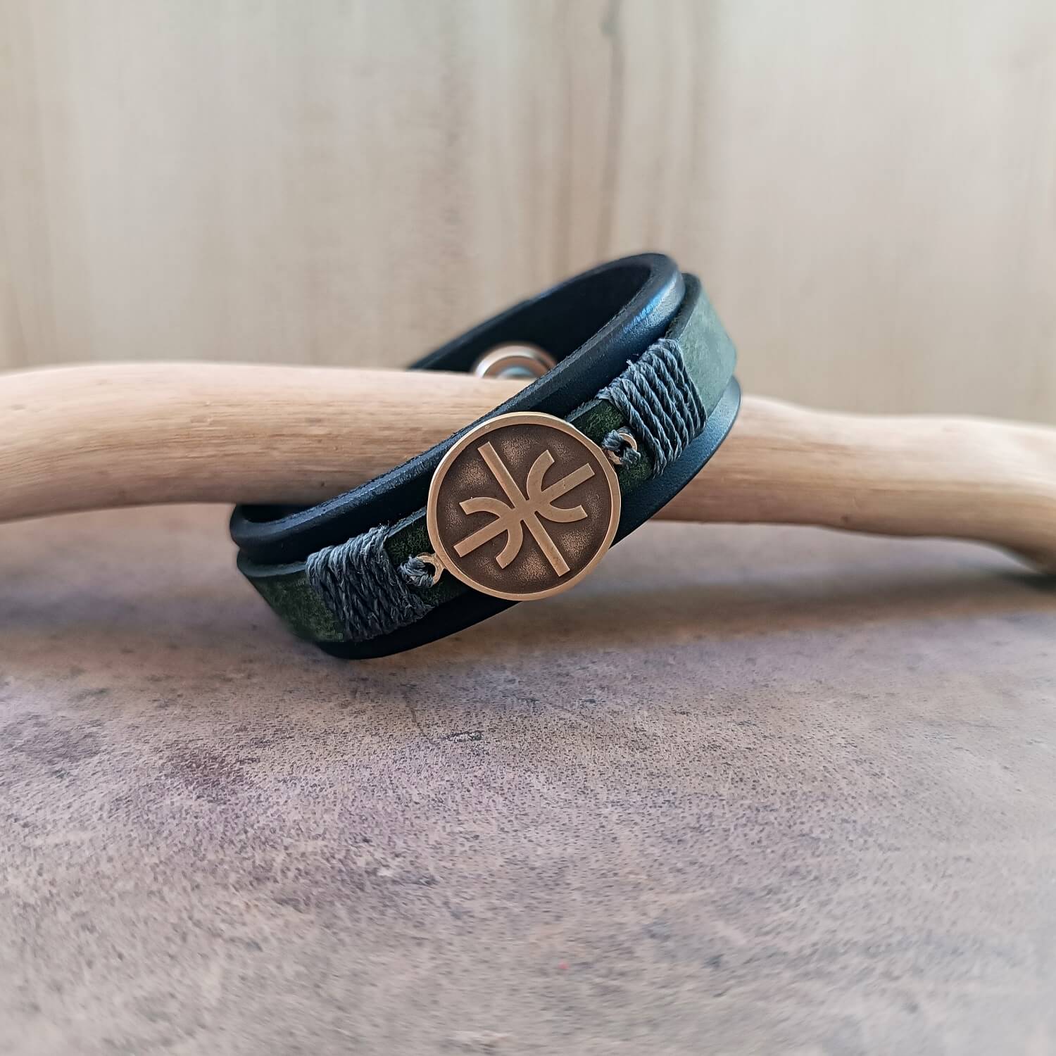 Black Green Layered Leather cuff Bracelet with Delphic Epsilon Pendant close up view