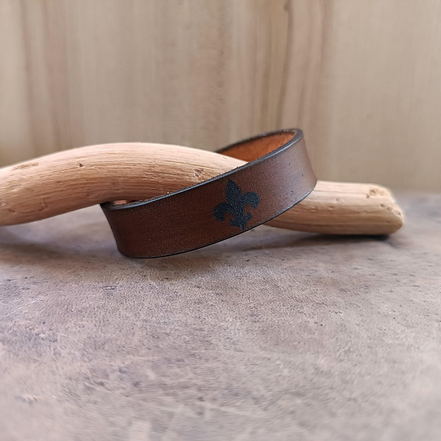 Dark Brown Crazy Horse Leather Cuff with Deeply Engraved Fleur de Lis Symbol