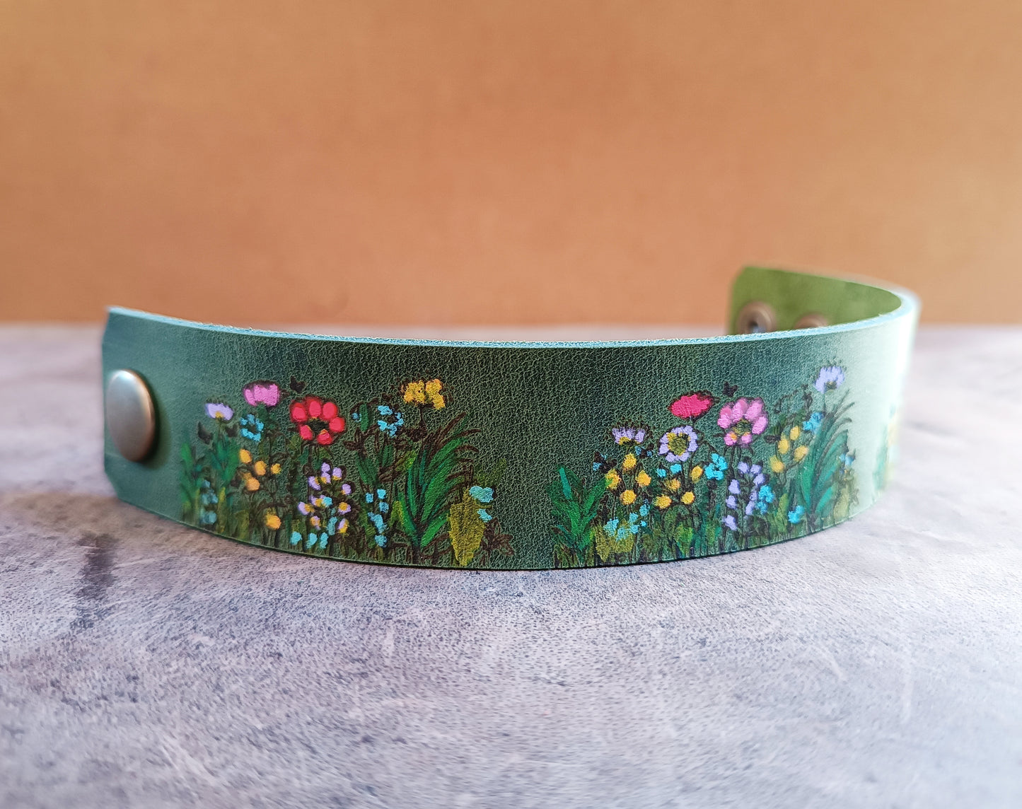 Mossy Green Leather Cuff Bracelet with hand painted colorful wild flowers.