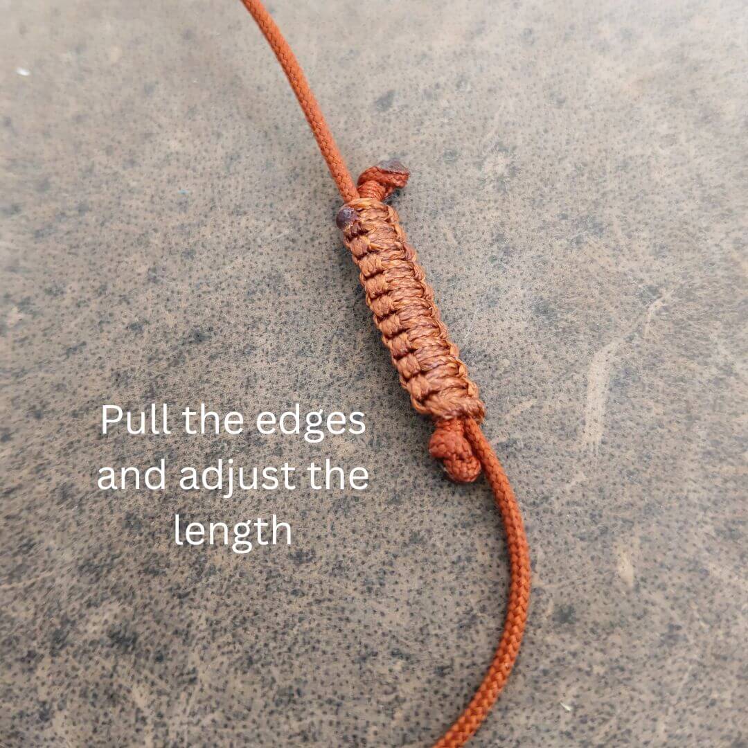 Close-up of an adjustable cord necklace with a macrame center and overlaid text reading 'Pull the edges and adjust the length' on a textured gray surface.