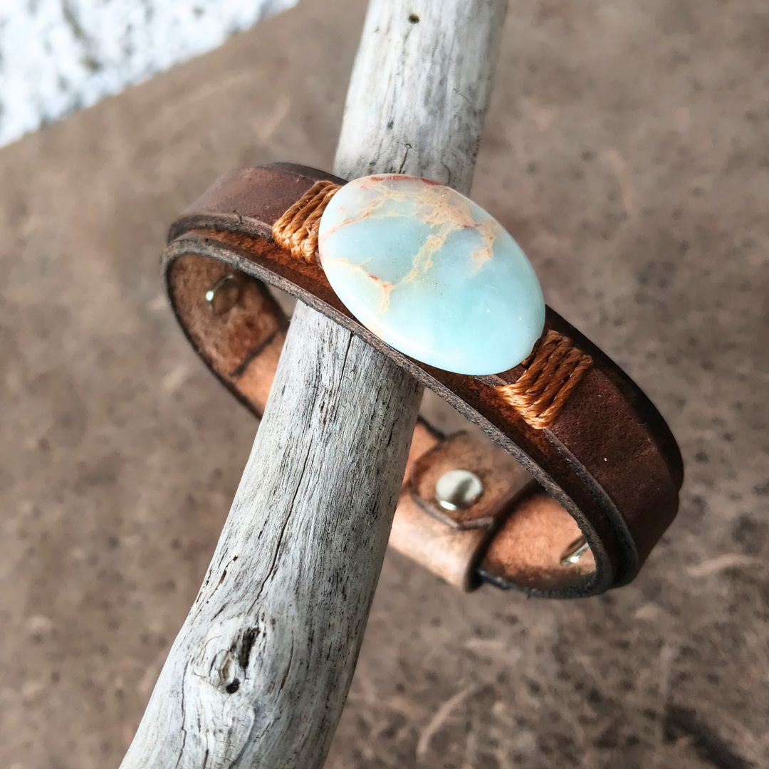 dark brown leather bracelet featuring a large oval rainbow Shoushan Stone.
