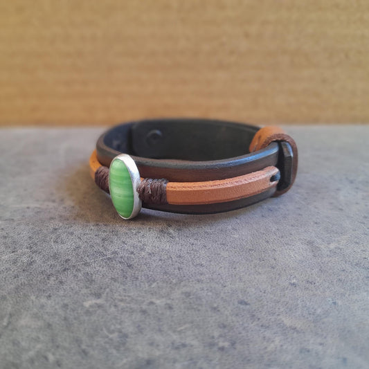 Side view of the Nephrite Jade leather bracelet, showing layered leather and details.