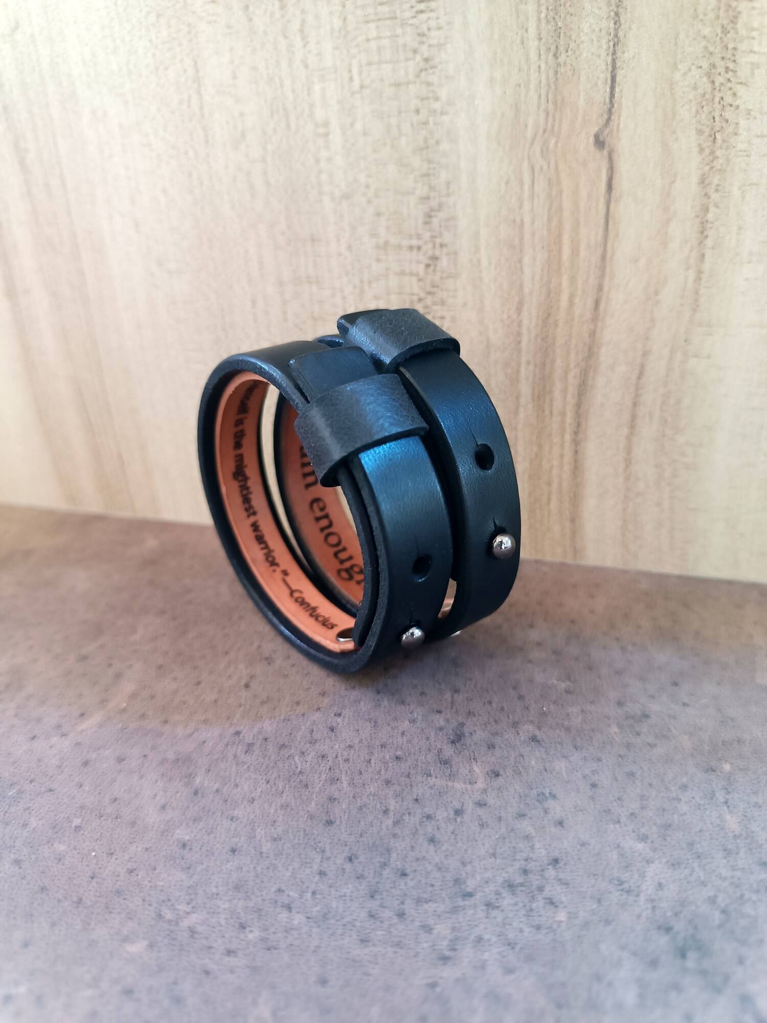 Custom Sleek Black Oiled Vachetta Leather Bracelet in watchband style, with custom engraved hidden message