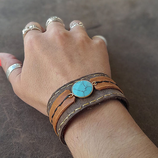 The Boho Turquoise Cuff worn on a M size wrist, demonstrating its comfortable fit, wide design, and romantic boho aesthetic.