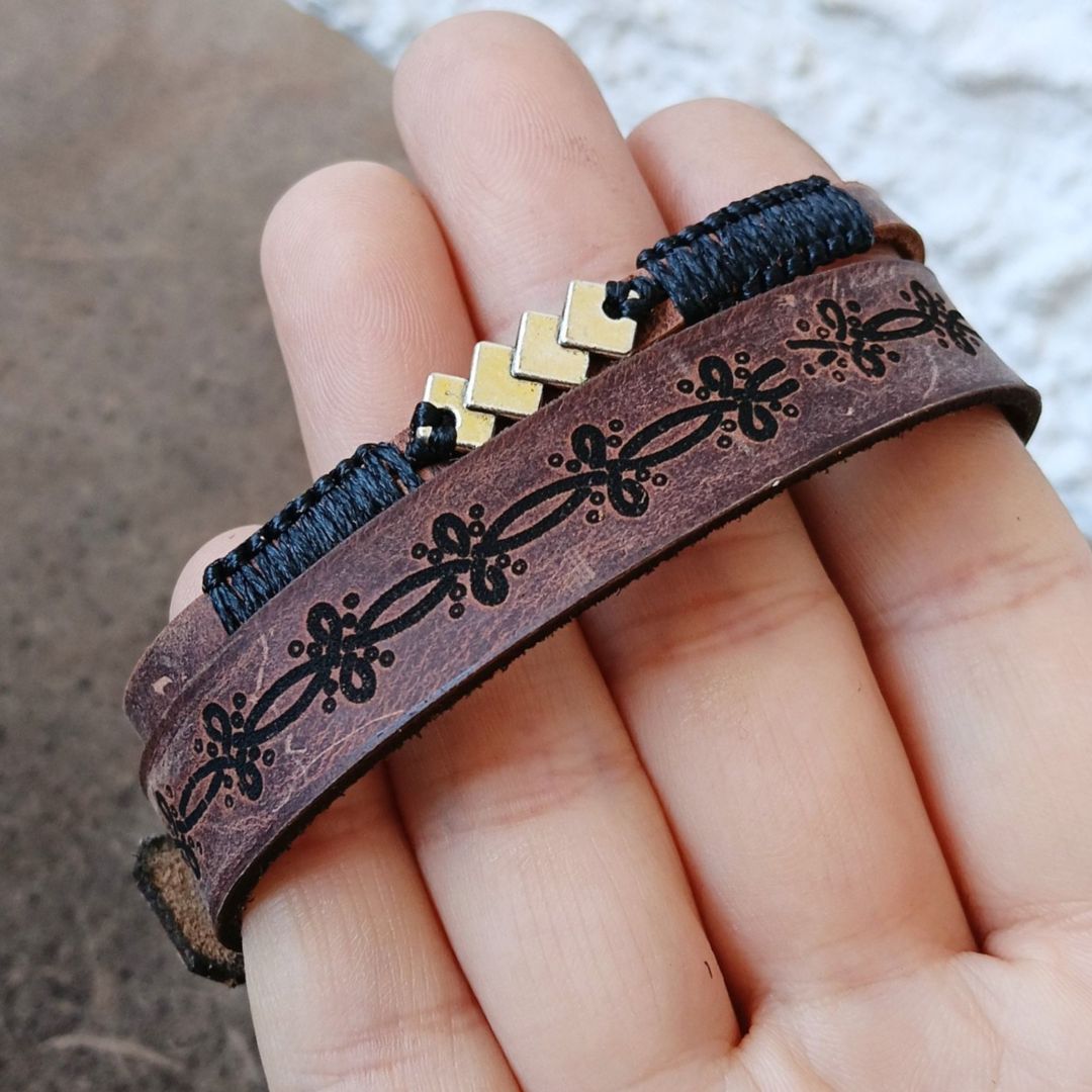 close up held in hand geometric bracelets set