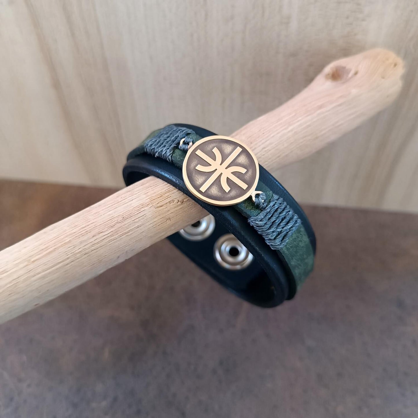 Black Green Layered Leather cuff Bracelet with Delphic Epsilon Pendant angled view