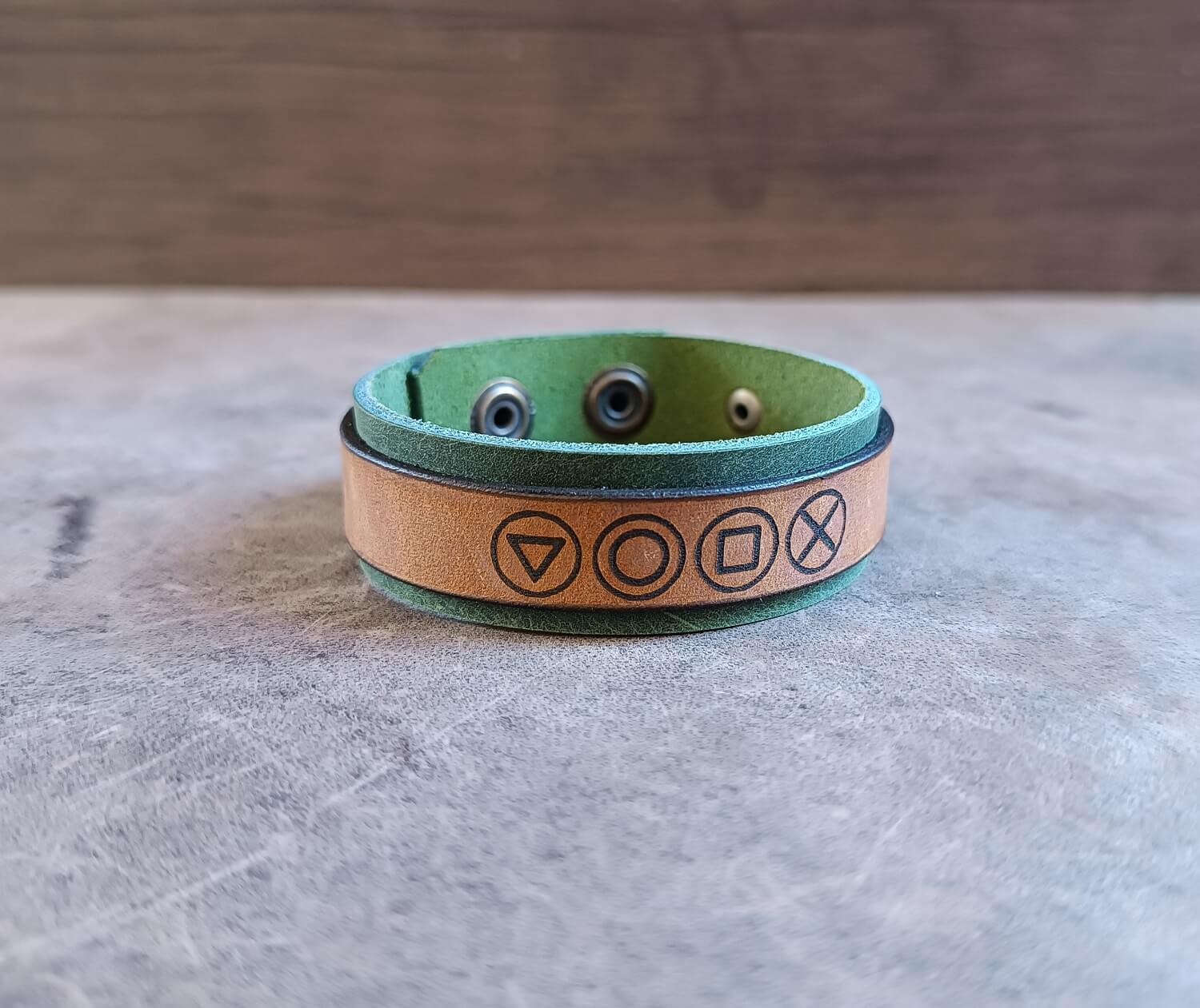 game controller icons leather cuff front view