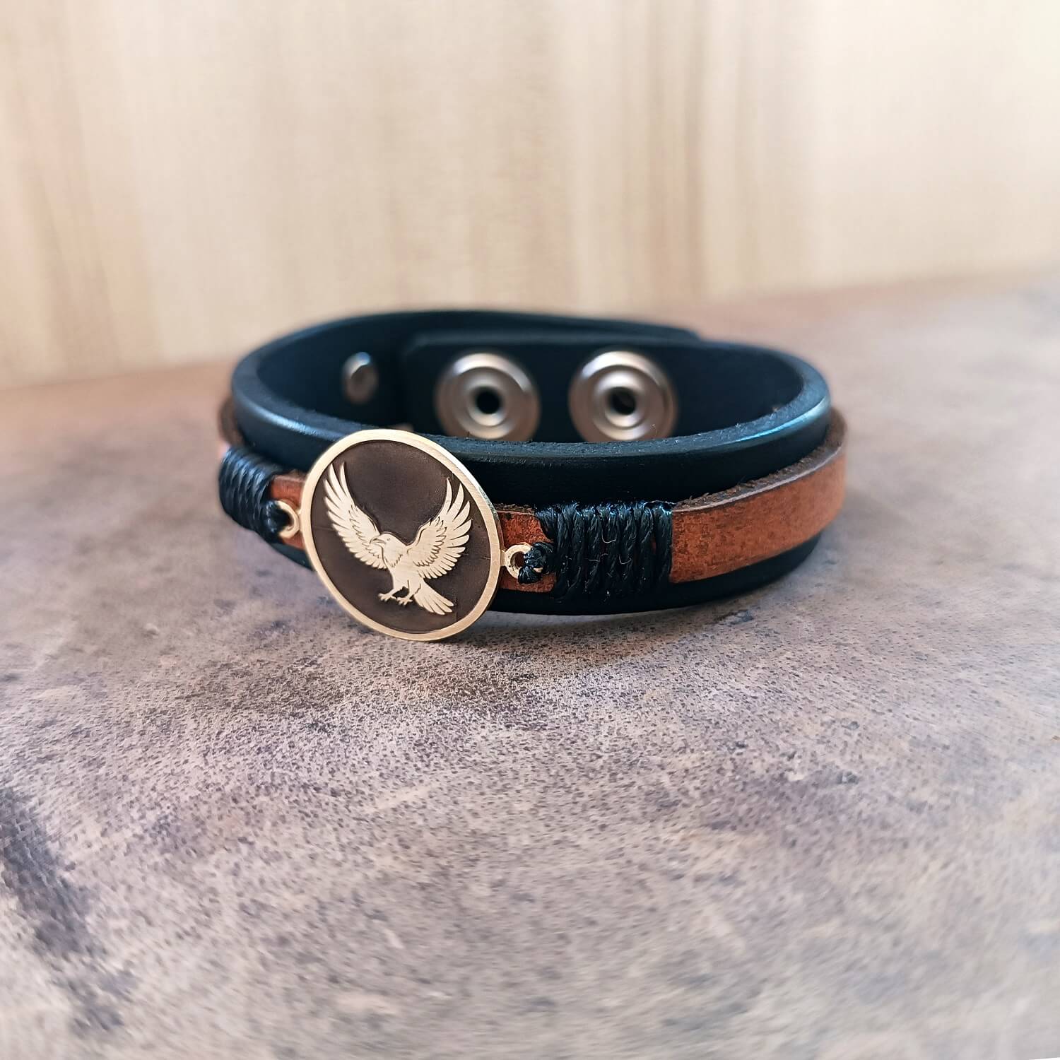 Leather bracelet with Karasuno Crow Pendant close up view