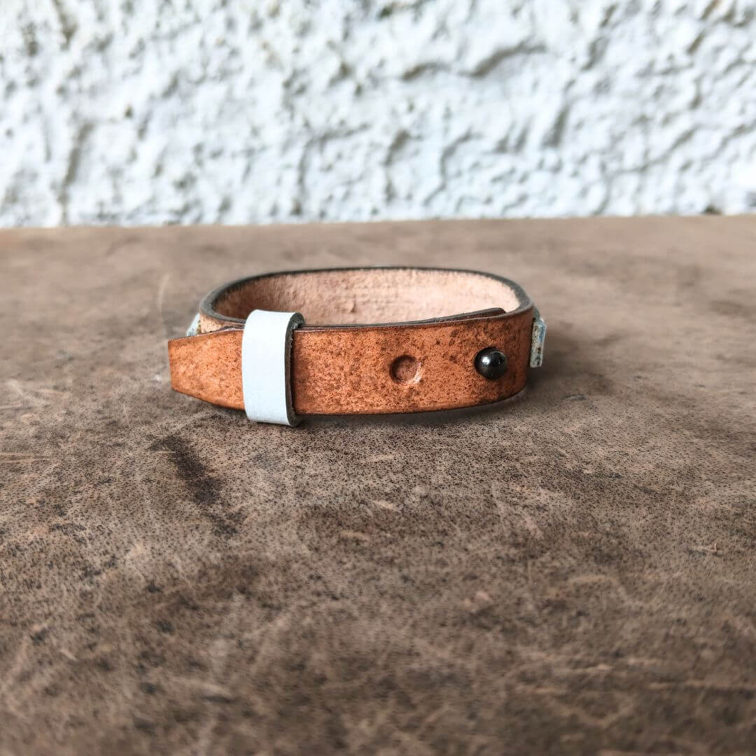 Back of OOAK tan leather bracelet with adjustable watchband-style closure
