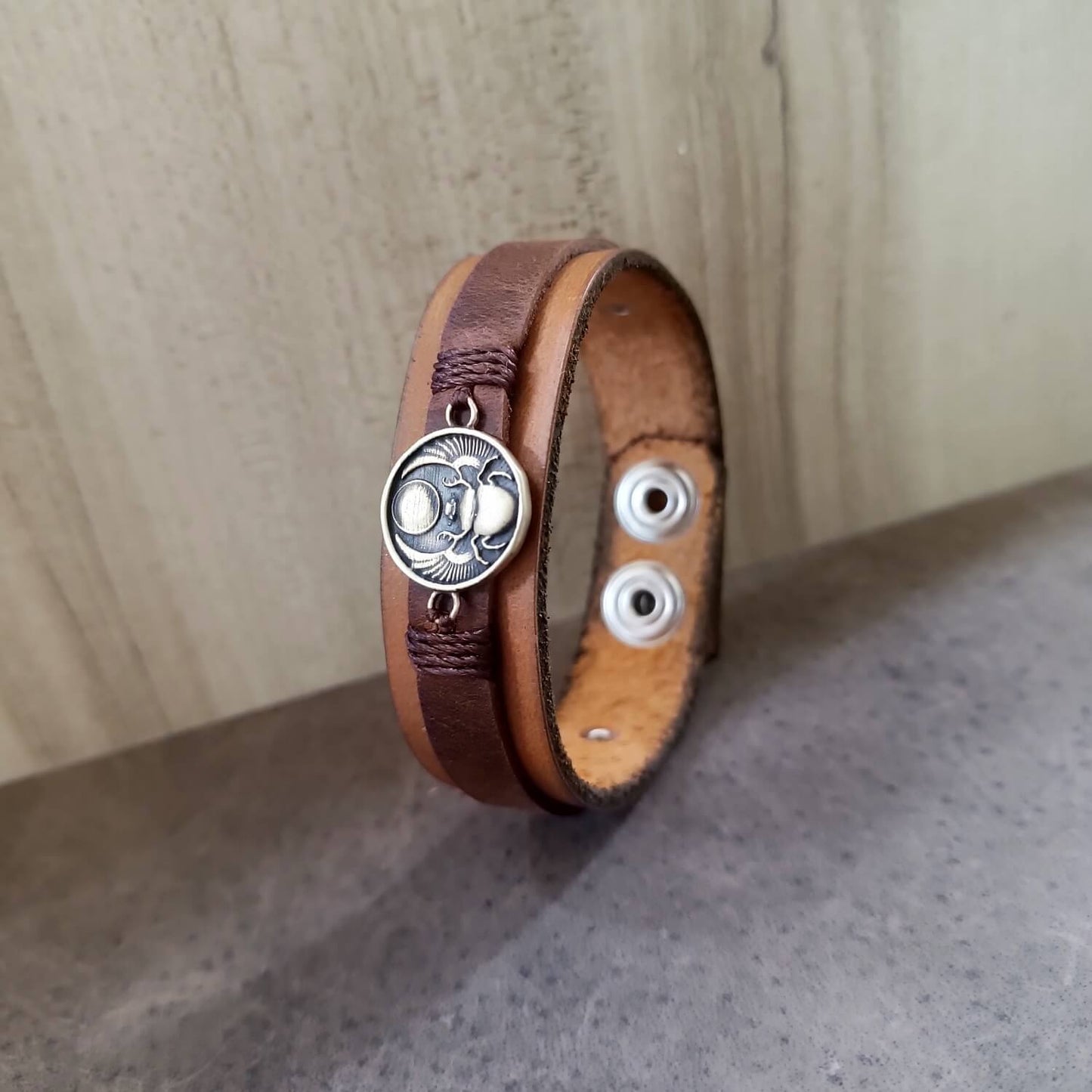 Brown leather bracelet with Egyptian scarab pendant