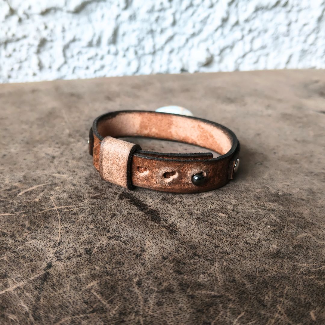 backside view of the dark brown leather bracelet with shoushan stone
