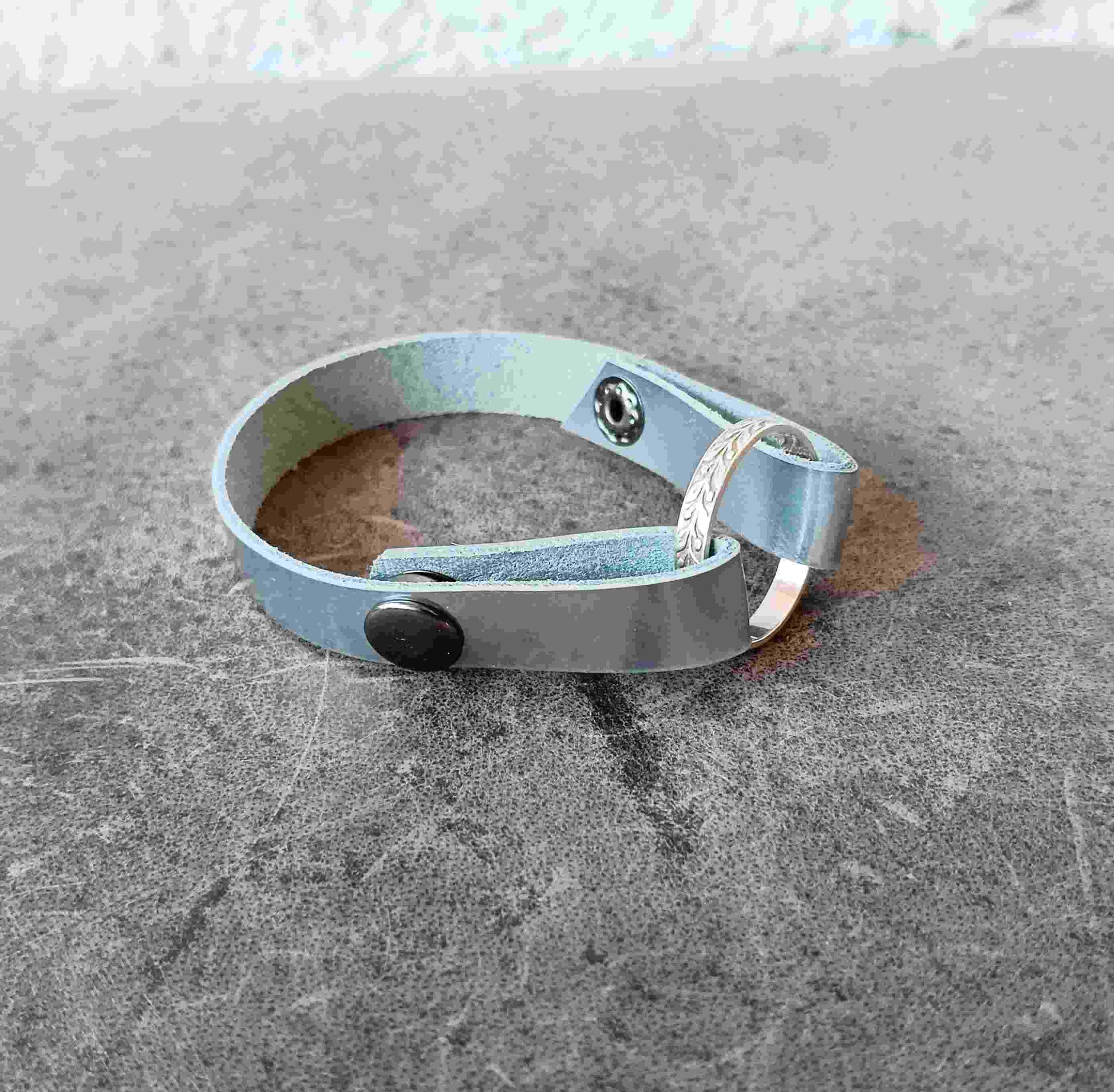 silver ringholder bracelet above angle view