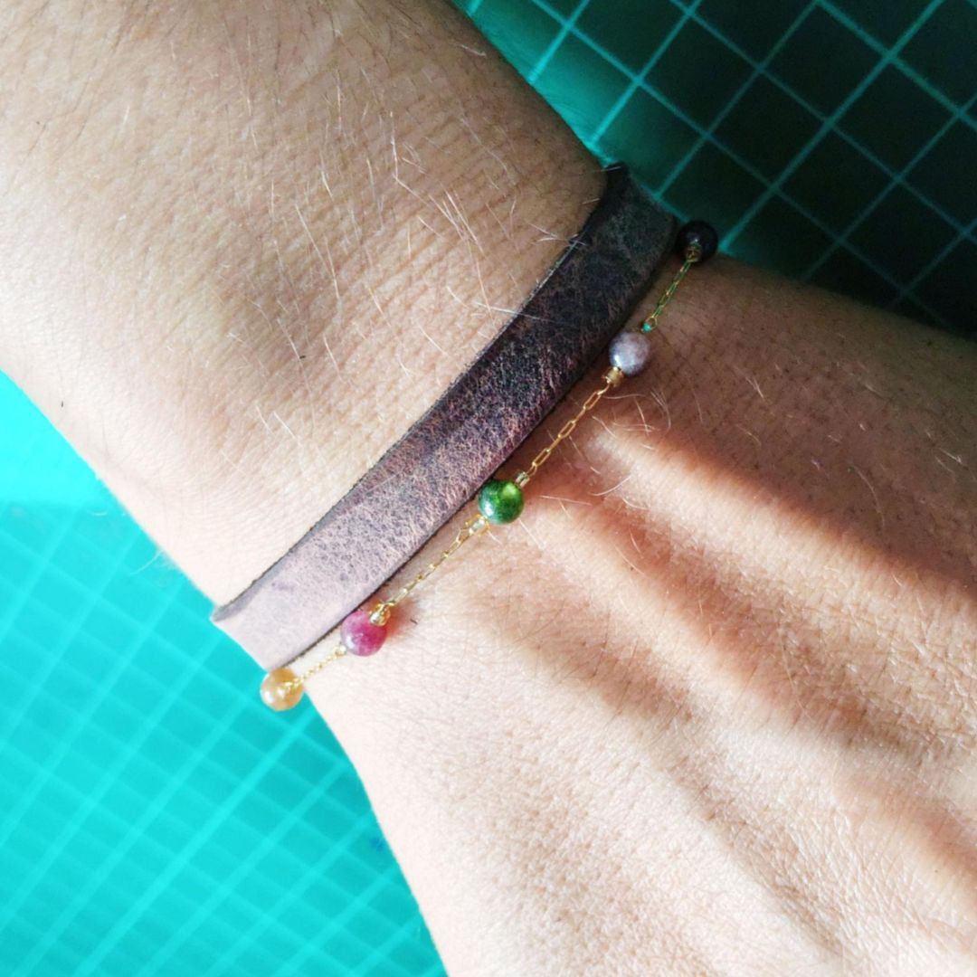 making of the anklet and thin band set worn by the creator