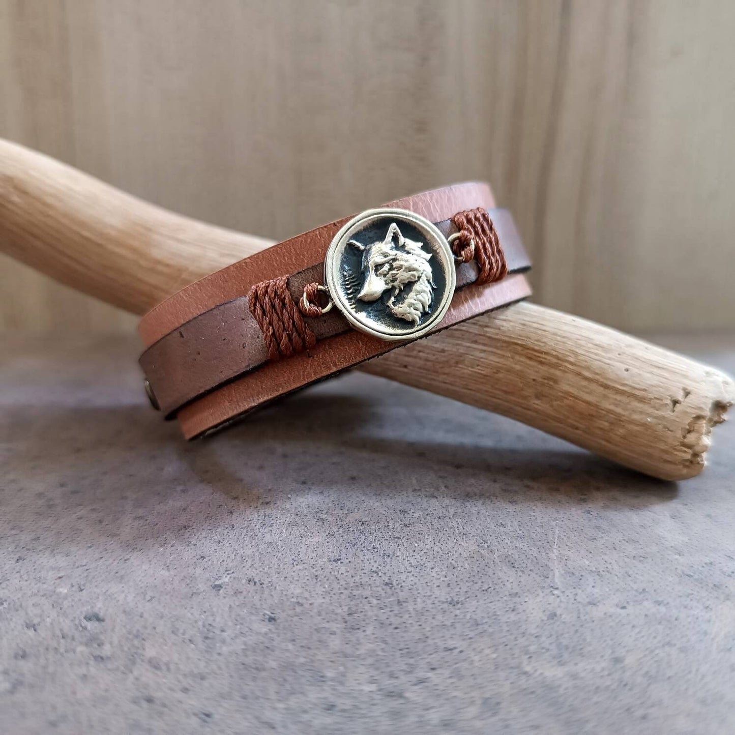 Brown Layered Leather Bracelet featuring a handcrafted brass wolf head pendant